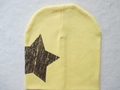 Yellow knitted baby beanie with a large vintage brown star print on a soft cotton texture - Brown Star / Yellow