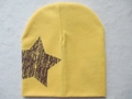 Yellow knitted baby beanie with a distressed brown star pattern in soft cotton fabric - Brown Star / Orange