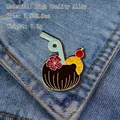 Detail of tropical drink enamel pin on denim with coconut cup and straw design - Coconut