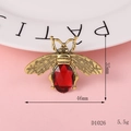 Vintage style metal bee charm with oval red gemstone and textured wings, 46mm width - D1026 Wine Red Bee