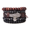Bohemian style stackable natural stone bracelet set featuring owl and wing silver charms - Owl Wing Lava Stone