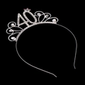 Macro shot of silver birthday tiara with sparkling rhinestones and number 40 detail - Number 40