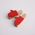 Pair of Christmas red glove wooden clips with metal springs on a white background - Red Glove