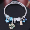 Vintage Boho-Armband mit blauem Kristall, Libellen-Anhänger und Gänseblümchen-Herz - Blauer Kristall Libelle / Blau