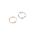 Aros minimalistas de acero inoxidable en oro rosa con un diseño decorativo de nudo - 20mm / Oro rosa