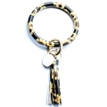 Détail du bracelet porte-clés en cuir PU à motif tournesol avec pompon doré et fermoir - Tournesol