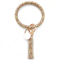 Dettaglio del bracciale portachiavi in pelle PU con motivo girasole leopardo e nappa - Girasole
