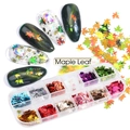 Nail art maple leaf sequins set with 12 colors of metallic glitter in a plastic box - 12 Compartment Laser Maple Leaf (FY-2)