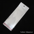 Pack of 100 transparent 7x20cm OPP plastic bags with self-adhesive seal and hanging holes - 100pcs/lot / 7x20cm