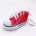 Mini canvas sneaker keychain in bright red with white laces and metal keyring - Red