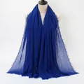 Solid royal blue pleated cotton scarf with frayed edges for women shown on a mannequin - Royal Blue (9#) / 180x90cm