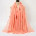 Coral pink pleated cotton scarf for women with textured fabric and raw fringe edges - Coral Pink