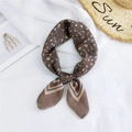 Elegant knotted brown leopard print silk scarf on white texture background with sun hat - Two-color Frame Leopard Brown / 58x58cm