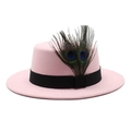 Detail of pink wool felt boater hat featuring natural peacock feathers and black ribbon - Pink