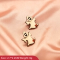 Detail of gothic ghost earrings for Halloween with size info on silk fabric background - Off-White Ghost Style
