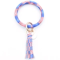 Detail of red white and blue American flag pattern PU leather wristlet with tassel keychain - National Flag