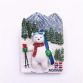 Detailed view of resin polar bear skiing souvenir fridge magnet with Norway text and flag - Norway Polar Bear