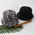 Reversible bucket hat with leopard print and solid black design in durable cotton - M(56-58cm) / Leopard Print Black