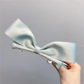 Detail of light blue satin ribbon bow hair clip with silver metal spring clip fastener - Spring Clips / Mint Green