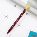Polka dot dark red metal ballpoint pen with large diamond top and gold accents - Wine Red with White Dots