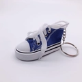 Mini high-top canvas sneaker keychain in blue and white with metal ring and classic laces - Sapphire Blue