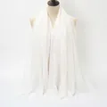 Bright white crinkle textured cotton headscarf for women on a beige mannequin - Pure White
