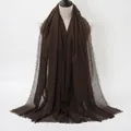Dark brown crinkled cotton scarf with fringed edges on mannequin for women - Dark Brown