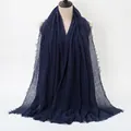 Navy blue crinkled cotton scarf with frayed edges shown on a mannequin - Navy Blue