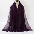 Deep purple crinkle cotton linen scarf for women with fringe edges on a mannequin - Deep purple