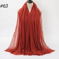 Crinkled cotton linen scarf in dark brick red featuring frayed edges and bubble texture - 180x90cm / Brick Red (#63)