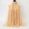 Light apricot pleated cotton scarf for women with natural fringed edges in solid color - Light Orange