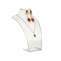 Clear acrylic neck bust display stand for organizing necklaces and earrings on white background - Clear