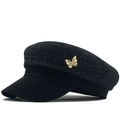Cappello newsboy in tweed nero da donna con filo argentato e fibbia a farfalla dorata - Nero
