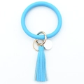 Detail of bright blue PU leather wristlet keychain with tassel and gold-tone metal hardware - Sky Blue