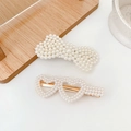 Elegant cream white pearl hair clips with butterfly and double heart designs in alloy base - Echo 2-Piece Set