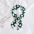 Dark green floral skinny scarf with white flower print tied in a loop on white fabric - 12 Jasmine Green