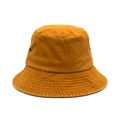 Detail showing mustard yellow washed cotton texture and metal eyelets on bucket hat - M / Yellow