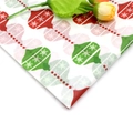 Macro detail of Christmas pattern tissue paper with red and green ornaments and snowflakes - Christmas Lantern