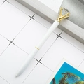 White metal ballpoint pen with large diamond top in a gold claw setting - White with Gold Parts