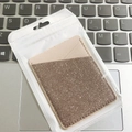 Adhesive rose gold glitter phone wallet sleeve with dual card slots in retail packaging - Fine Glitter Pink
