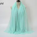 Lightweight mint green crinkle scarf for women featuring frayed edges and soft texture - Mint Green