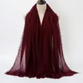 Deep burgundy crinkle cotton scarf featuring a natural frayed edge and textured finish - Dark Wine Red