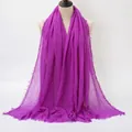 Deep purple cotton linen scarf with wrinkled texture and fringe edge on a mannequin - Deep purple