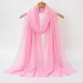 Lightweight pink cotton linen scarf with vertical crinkle texture and frayed fringe edges - Pink