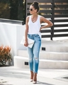 Jeans slim blu chiaro strappati con chiusura a bottoni e dettagli consumati donna - L / Azzurro