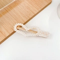 Elegant gold metal hair clip with white faux pearls on a minimalist wooden tray - Gold Heart Pearl Hairpin