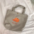Graue Canvas-Tragetasche mit Orangen-Aufdruck und japanischer Schrift auf weißem Stoff - Grau-orange