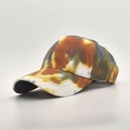 Detail of multi-color tie-dye baseball cap featuring blue, brown, and yellow cotton fabric - Coffee White Tie-Dye