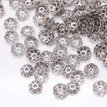 Detailed macro view of silver flower bead caps for DIY jewelry and bracelet making - GPHJ037