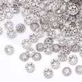 Macro shot of silver hollow petal spacer beads for DIY jewelry making accessories - GPHJ047